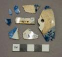 Blue on white transferprinted pearlware vessel body fragments, white paste, 1 fragment perforated, likely teapot body