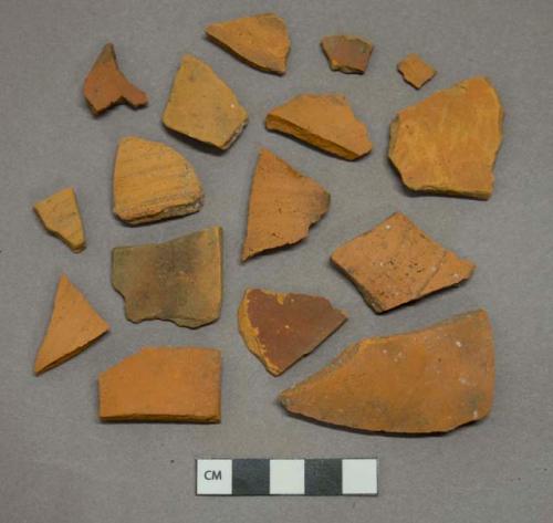 Undecorated unglazed redware vessel body fragments, likely terracotta