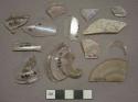 Colorless glass vessel fragments, 1 stemware base fragment, 3 fragments of possible vessel base crossmend