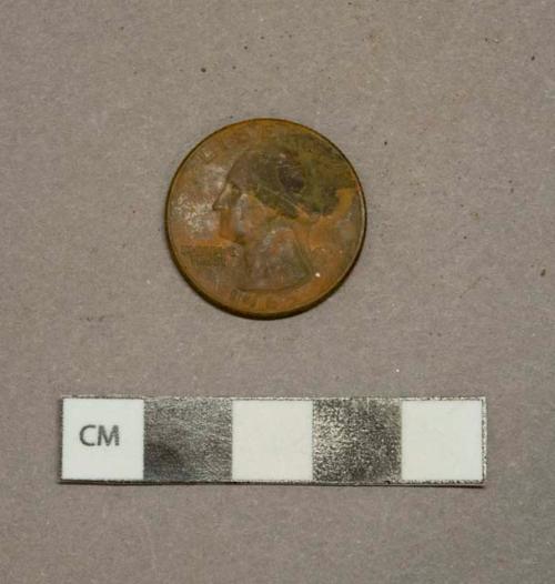 Metal alloy US quarter, intact yet oxidized, dated 1965