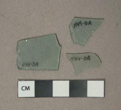 Aqua flat glass fragments, weathered