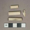 White undecorated kaolin pipe stem and bowl fragments, 1 bowl fragment, 2 stem fragments with 4/64" bore diameter, 1 stem fragment with 5/64" bore diameter