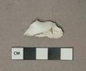 White undecorated molded porcelain fragment, white paste, possibly figurine