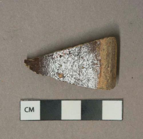 Brown salt glazed stoneware, visible temper, likely sewer pipe fragment