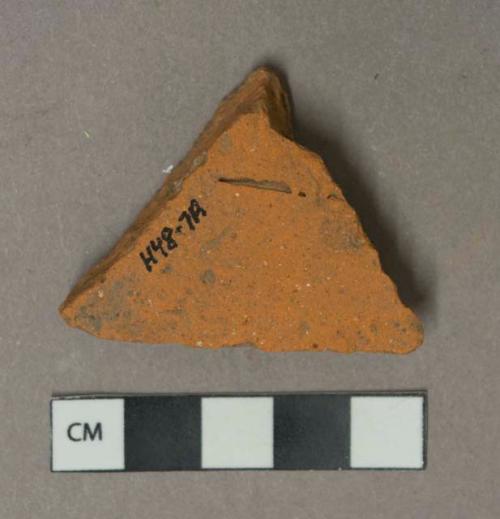 Red ceramic rooftile fragment, visible temper