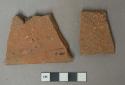 Red ceramic roof tile fragments, 1 fragment with nail hole