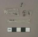 Colorless glass vessel fragments, 1 tube fragment