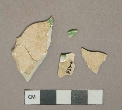Green shell-edged pearlware vessel rim fragments, white paste