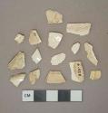 Creamware vessel body fragments, 1 fragment with molded decoration, light buff paste