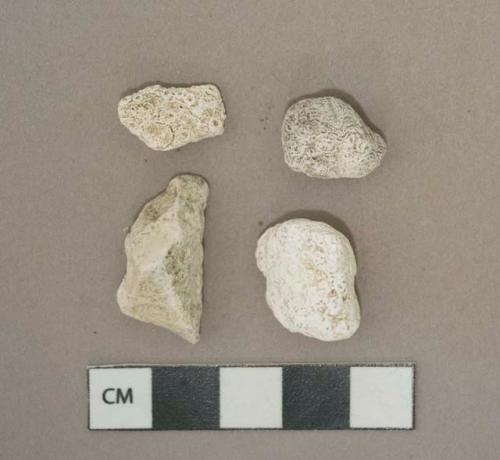 White mortar fragments, degraded