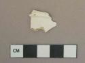 White undecorated pearlware vessel base fragment, white paste