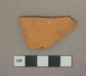 Unglazed undecorated redware vessel body fragment