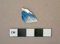 Blue on white handpainted underglaze pearlware vessel body fragment, white paste