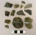 Dark olive green glass vessel body fragments, weathered