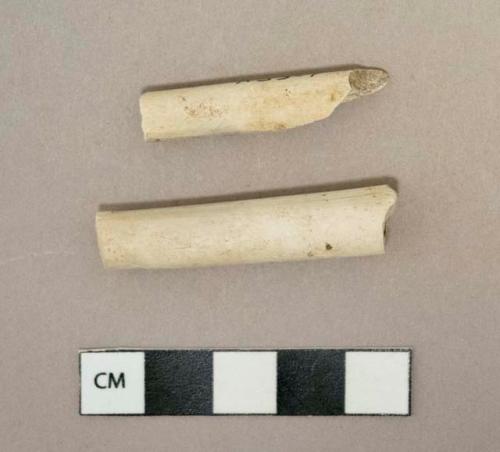 White undecorated kaolin pipe stem fragments, 1 stem with 8/64" bore diameter, 1 stem with 5/64" bore diameter