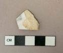 White ironstone vessel body fragment, black transfer printed, possibly makers mark, white paste