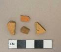 Unglazed undecorated redware vessel body fragments