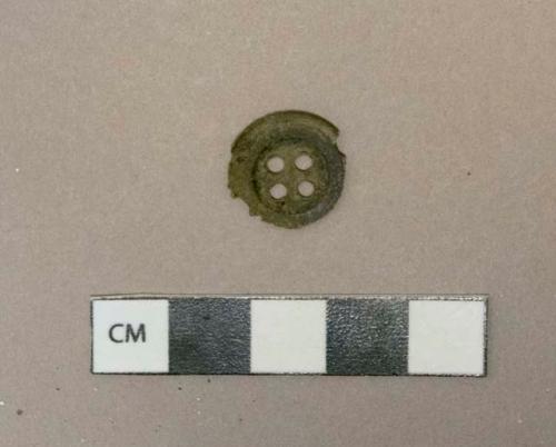 Cuprous alloy 4-hole button fragment, oxidized