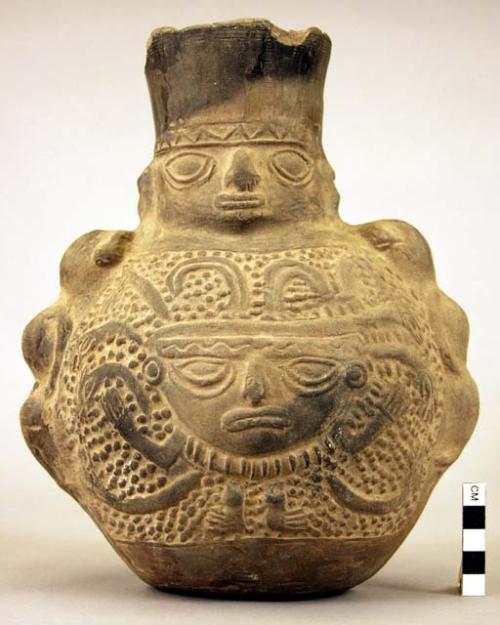 Pottery vessel, human face, stamped