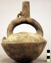 Black pottery jar, mount on hollow handle