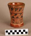 Cup with polychrome geometric design