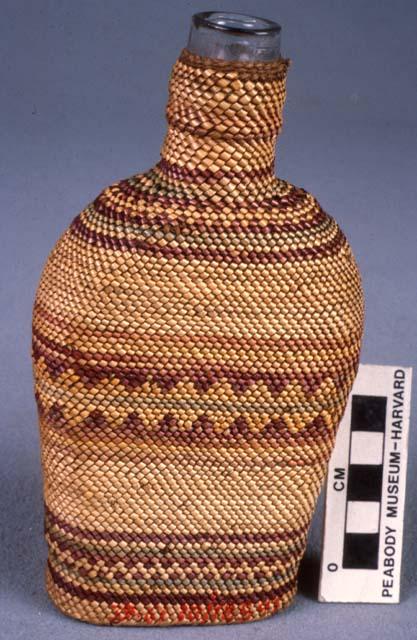 Basketry bottle cover; technique--twined; design of plain and zigzag horizontal