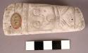 CAST, incised human face, linear designs, rectangular, tapered, abraided