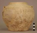 White ware urn - 2 loops for handles on opposite sides of rim; parellel grooves following shoulders of jar;