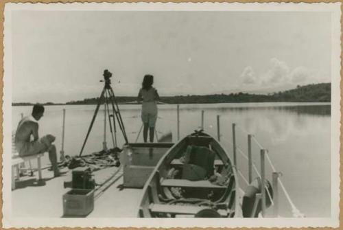 Chiriquí Lagoon, woman standing on bow or stern of boat