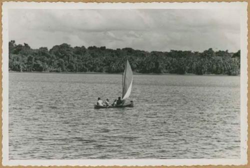 Chiriquí Lagoon off Cricamola River, people in Ngobe-Bugle canoe