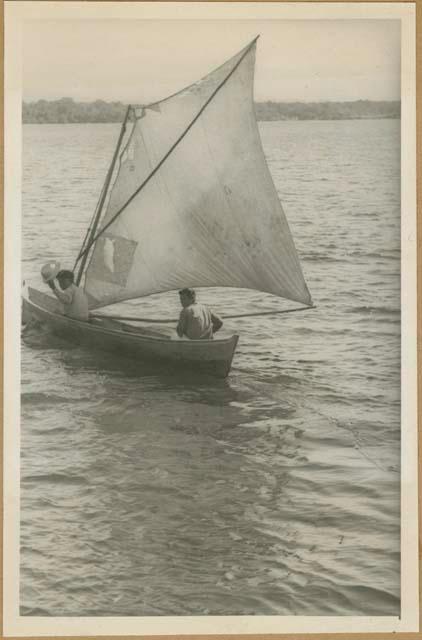 Chiriquí Lagoon, two people in Ngobe-Bugle canoe