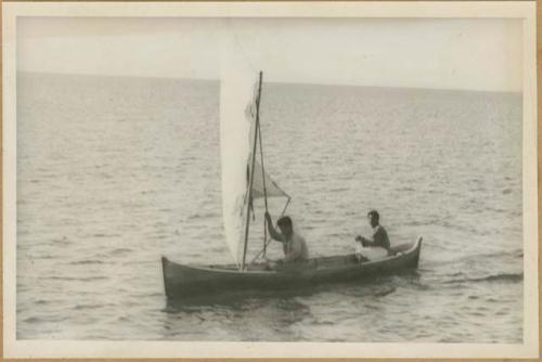 Chiriquí Lagoon, two people in Ngobe-Bugle canoe