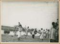 Ngobe-Bugle throwing sharpened balsa poles at opponents' ankles, next to Cricamola River, during Balseria