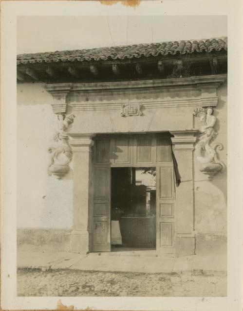 A doorway with sculptural details