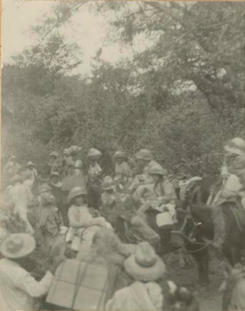 Group with baggage and burro