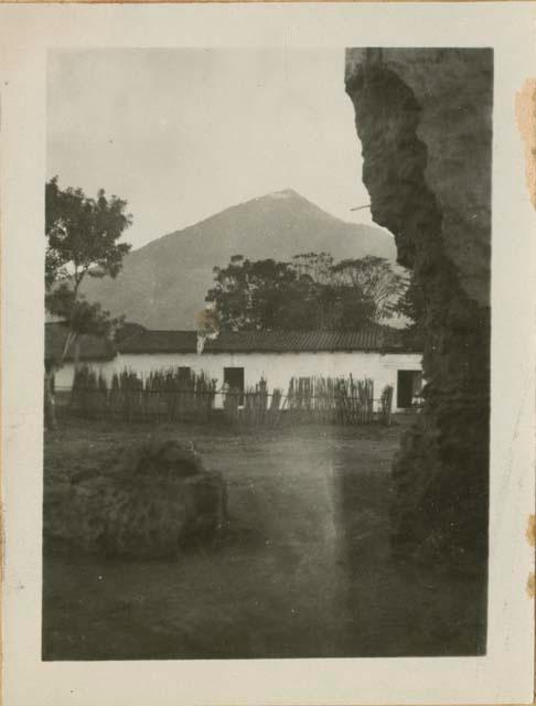 Building, with volcano in background