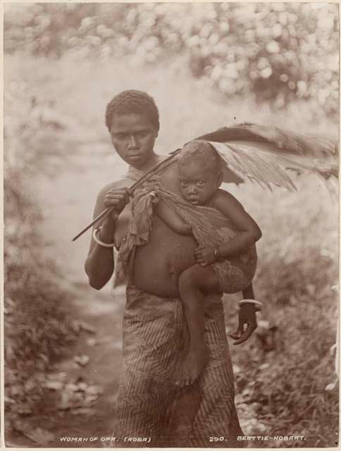 Woman carrying a child