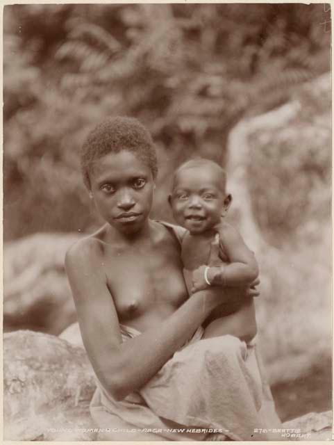 Young woman holding baby