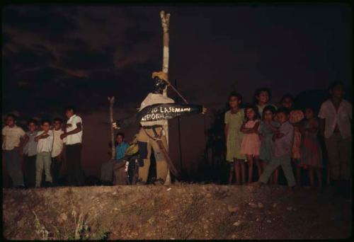 'Judas' figure during Easter week at aldea on Flores-Melchor road