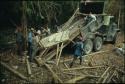 Operacion Rescate: an Ixtutz stela being loaded on Army truck by Eric von Euw
