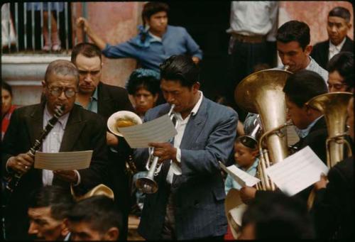 Comalapa, Ladino band by shrine in fiesta