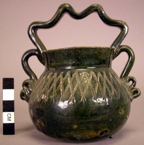 Dark green glazed handled pot