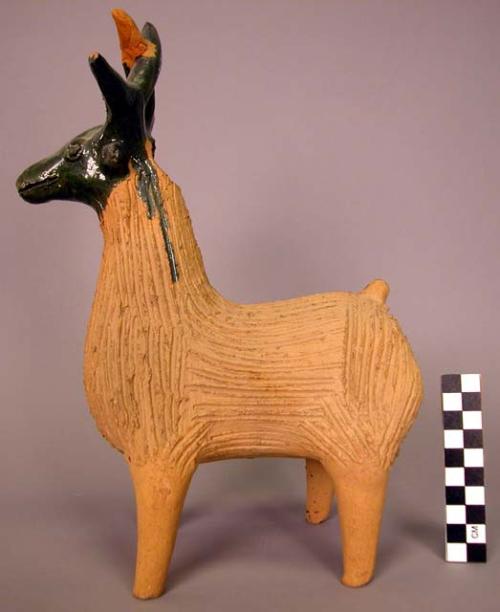 Ceramic partially glazed deer figurine