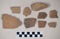 Ceramic, earthenware, body, base, and rim sherds with punctate and impressed decoration