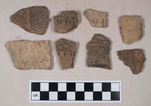 Ceramic, earthenware, body and rim sherds with punctate, incised, and impressed decoration