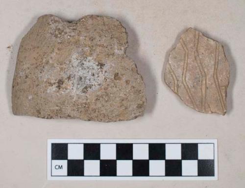 Ground stone, steatite vessel rim and body fragments with incised decoration