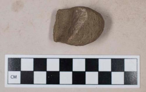 Ground stone, atlatl weight fragment