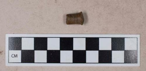 Ground stone, cylinder fragment