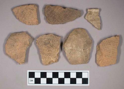 Ceramic, earthenware, body and rim sherds with impressed decoration