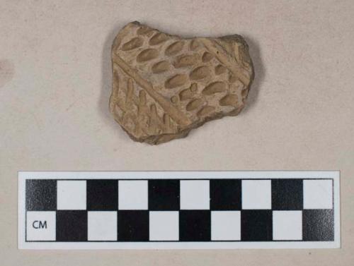 Ceramic, earthenware, body sherd with punctate and impressed decoration